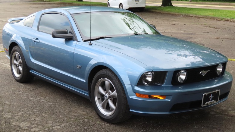 Blue 2005 Ford Mustang GT parked