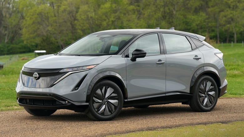 Nissan Ariya parked on a gravel driveway