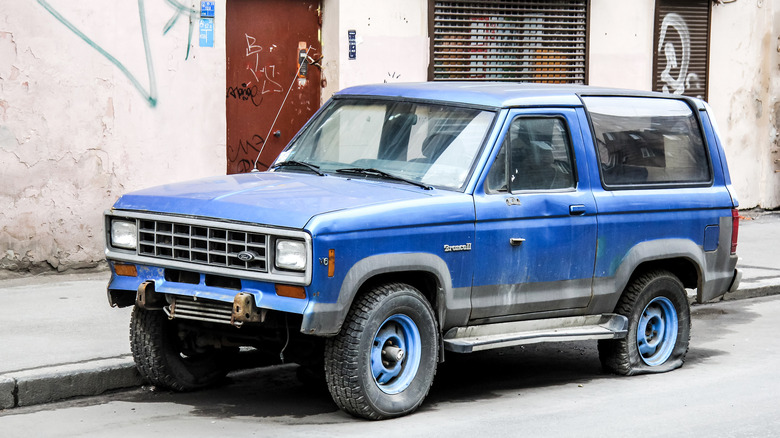 Dilapidated Ford Bronco II on the street in Moscow, Russia