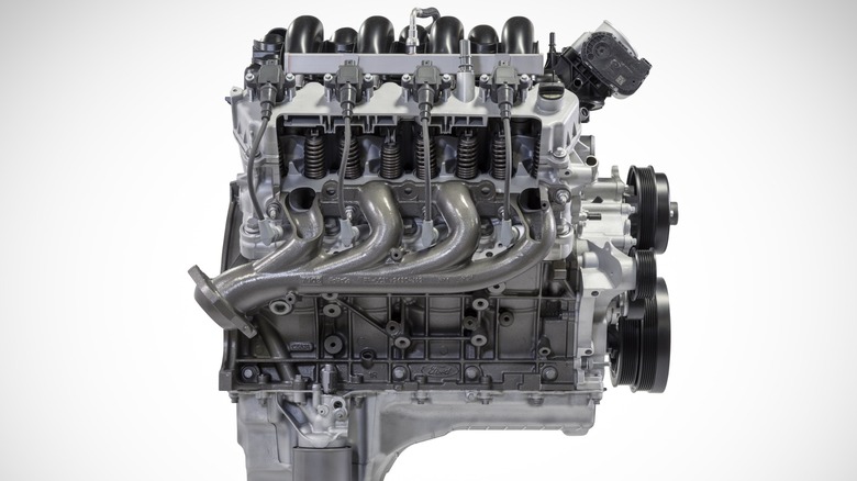 Ford 7.3L Godzilla gas engine on white background