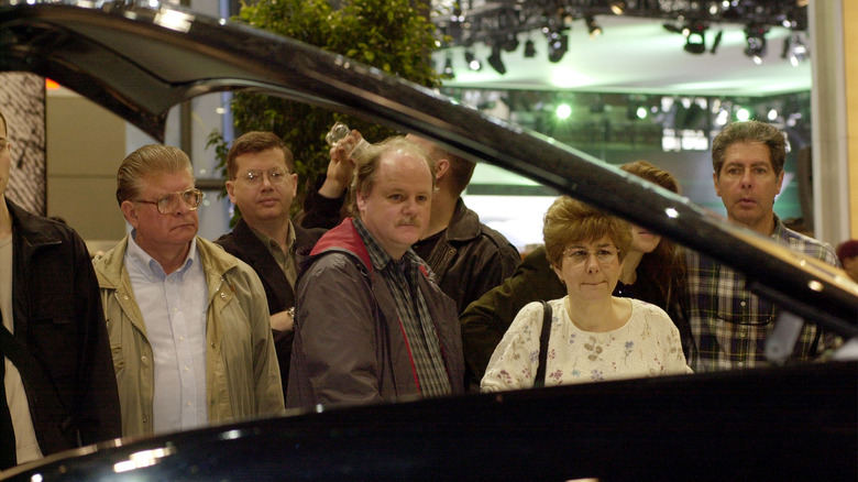 Visitors looking at Ford Forty-Nine