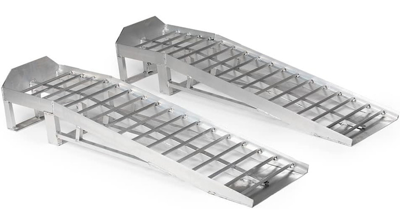 A pair of Titan Ramps aluminum car ramps