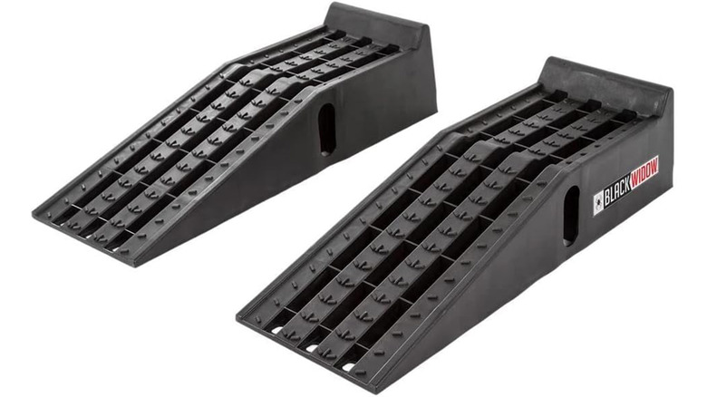 A pair of Black Widow brand car ramps