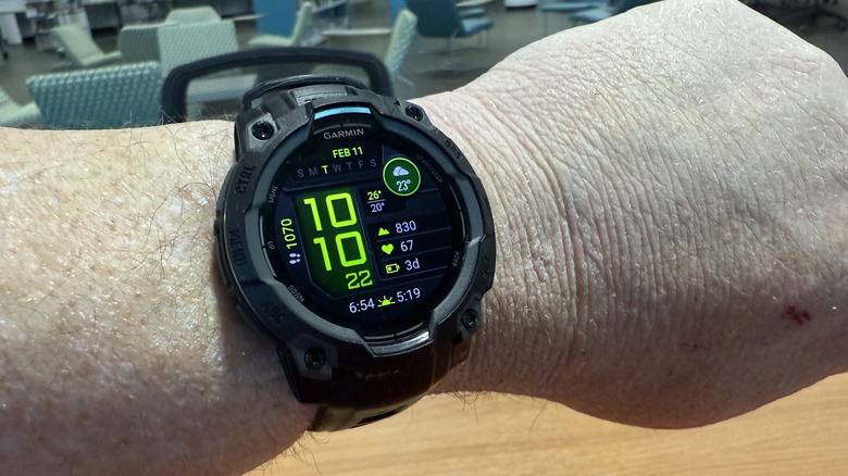 Garmin Instinct 3 AMOLED showing time and other details