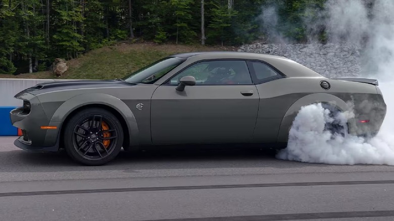 Dodge Challenger smoking its tires