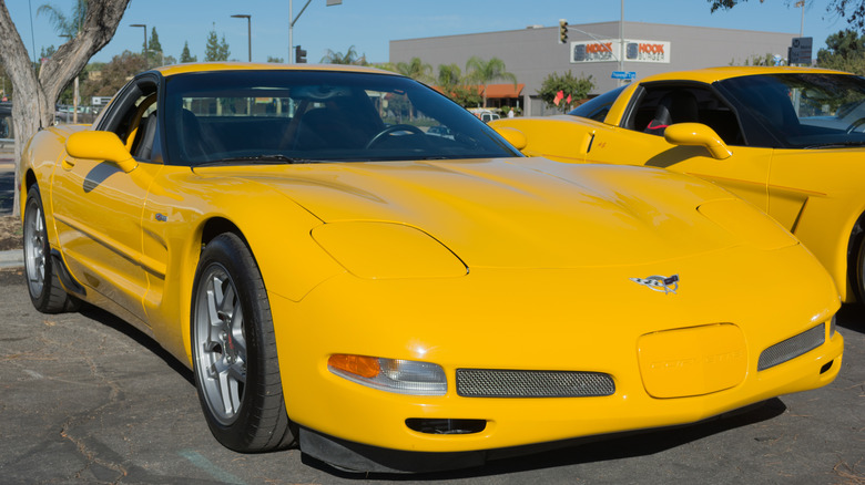 Yellow C5 Corvette parked