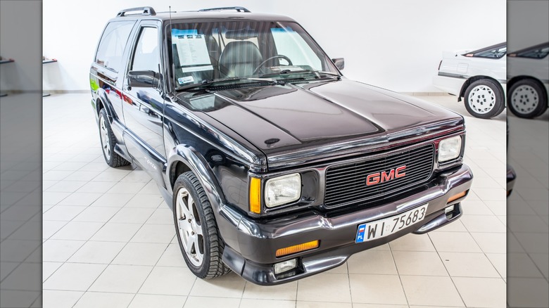 A blacl GMC Typhoon, glossy and shiny, is pictured in Nadarzyn, Poland for the Warsaw Oldtimer Show.