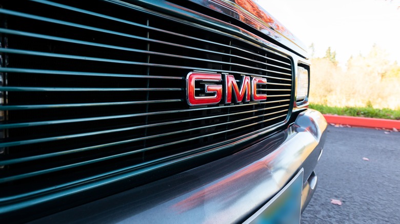 A GMC logo sits on a black grill beside the GMC Typhoon's signature square headlights.