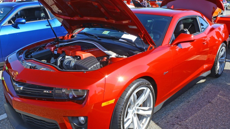 Red Camaro ZL1 with open hood