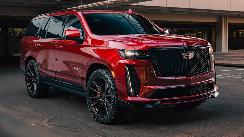 Red Cadillac Escalade-V parked garage