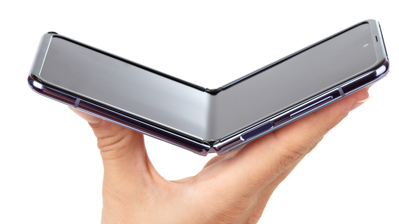 Person holding foldable phone