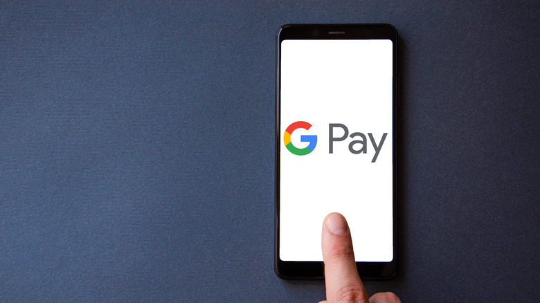 Google Pay logo on phone