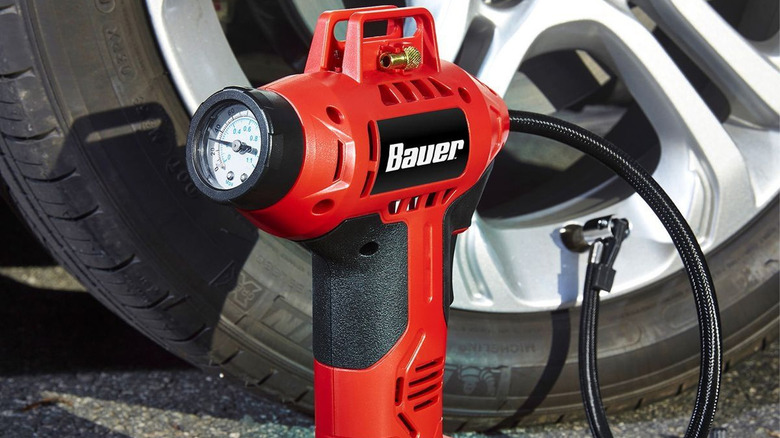 bauer cordless inflator connected to tire