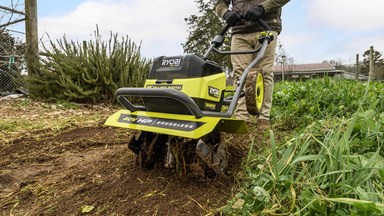 Ryobi tiller on dirt