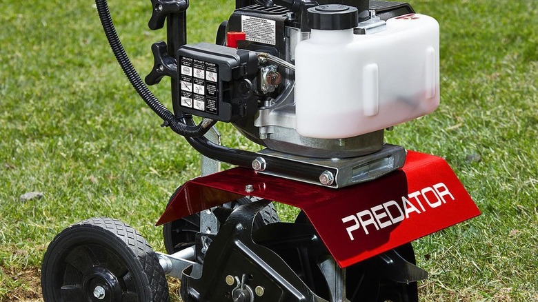 Predator cultivator closeup in grass