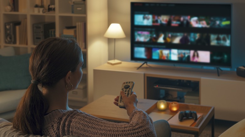 woman watching a show on TV