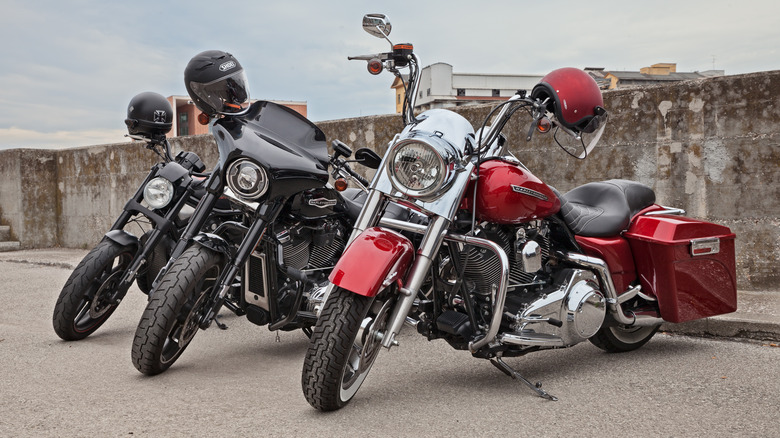 three harley-davidson motorcycles