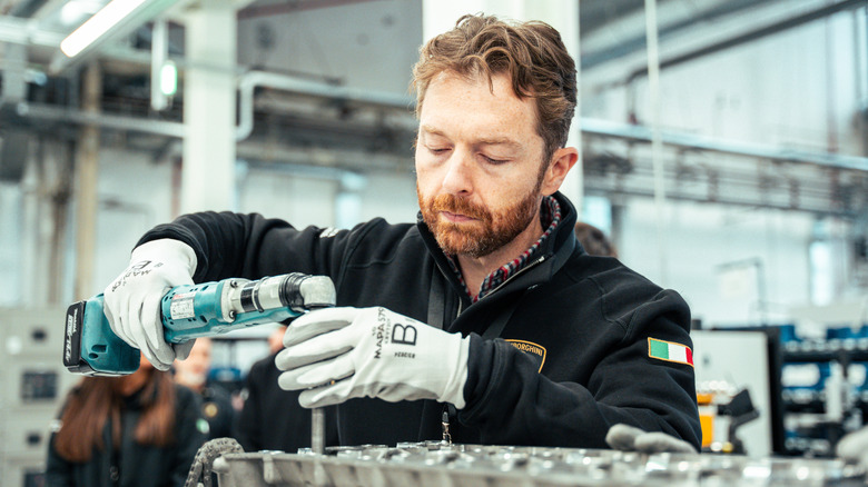 The author torquing head bolts on a Revuelto V12.