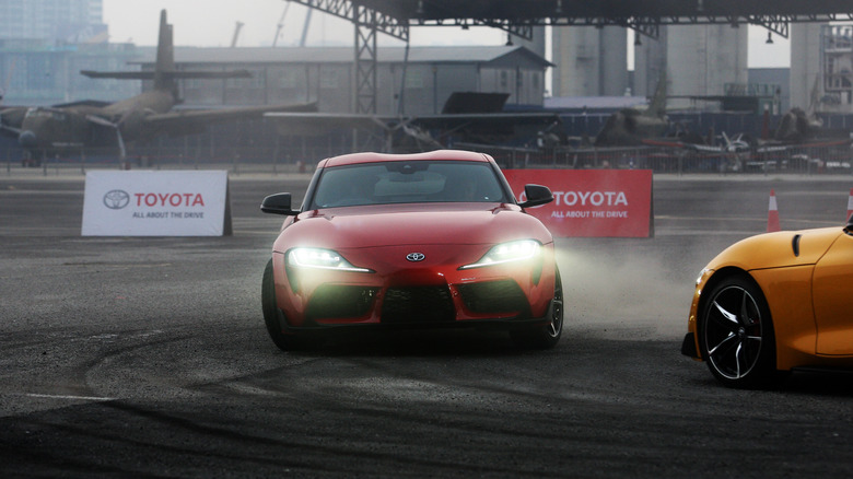 red Toyota GR Supra on race track