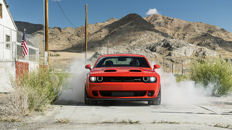 Dodge Challenger Hellcat driving dirt road