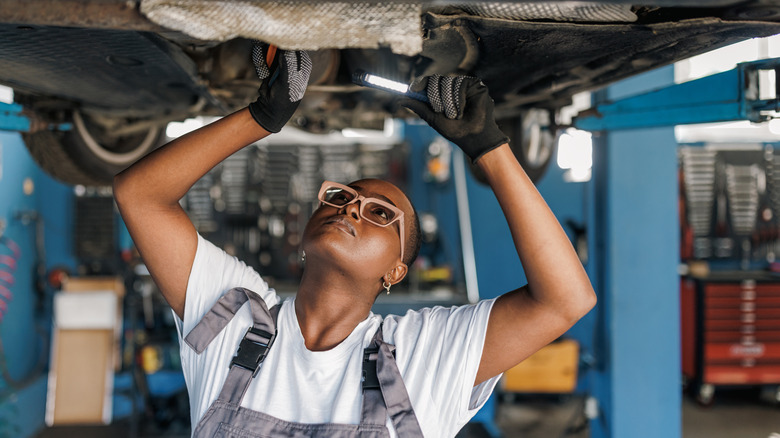 Mechanic working on car