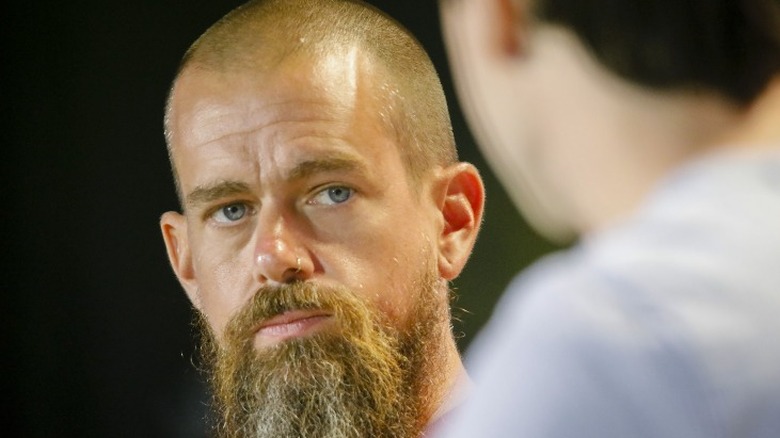 Jack Dorsey behind blurred figure