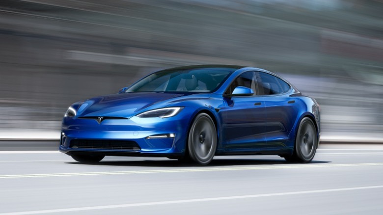 blue Tesla Model S driving