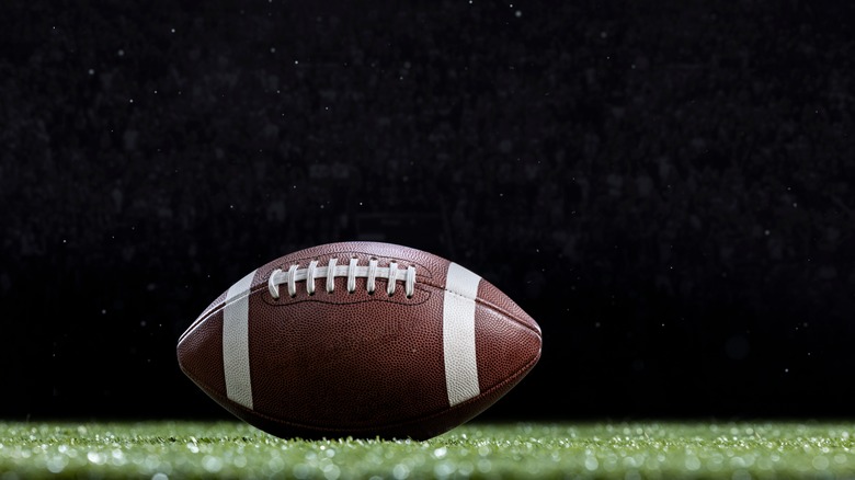 A football sitting on a field