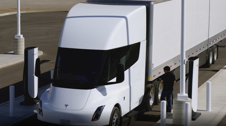 driver charges tesla semi