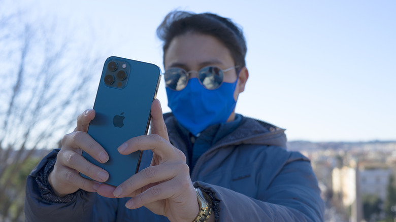 iPhone person sunglasses mask