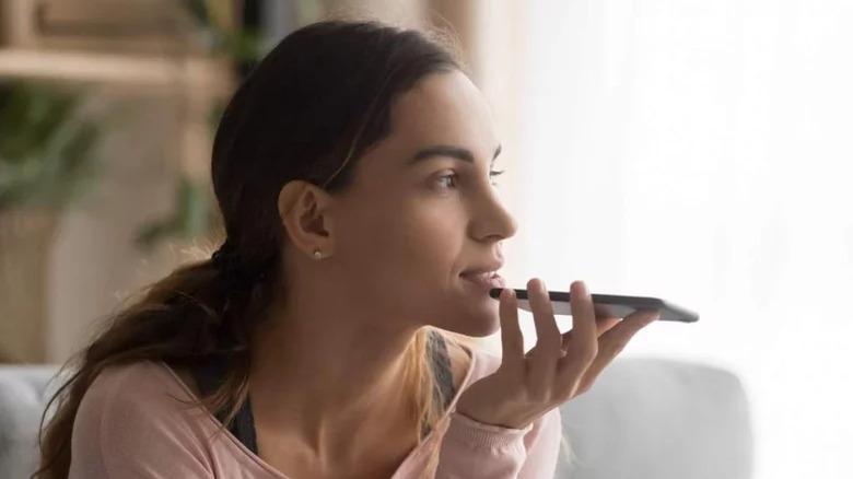 Woman speaking into phone