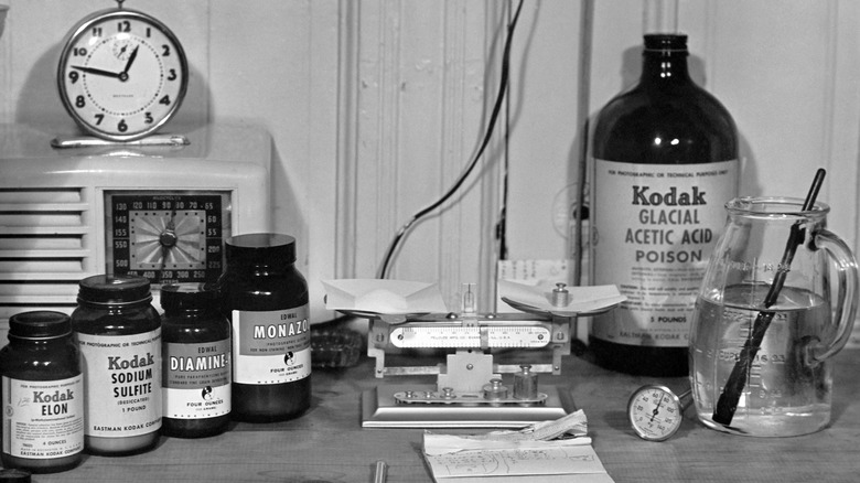 Old photo of darkroom chemicals