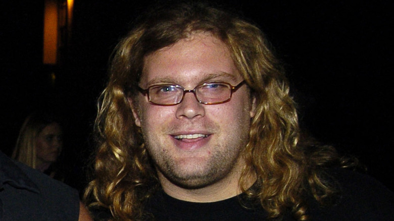 Mikey Teutul smiling for a photograph