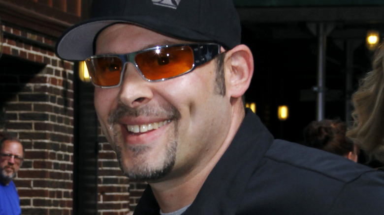 Paul Teutul smiling as he arrives at The Late Show