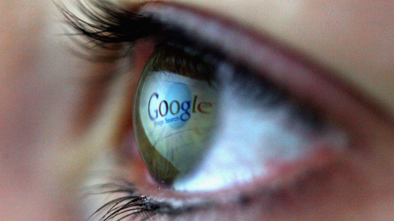 Google logo reflected on eye