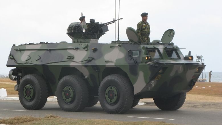 Type 92A armored vehicle riding down road