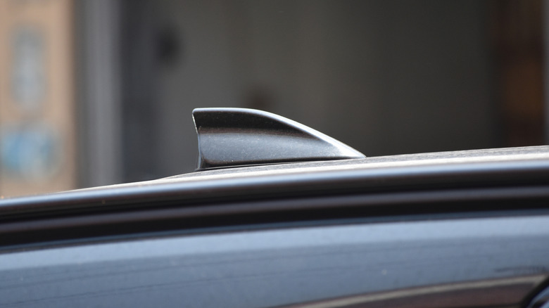 Shark fin antenna on roof of car