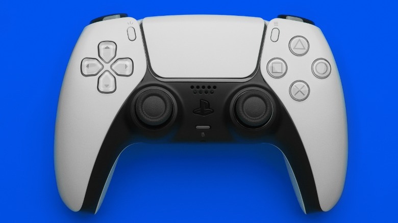 White controller on a blue background