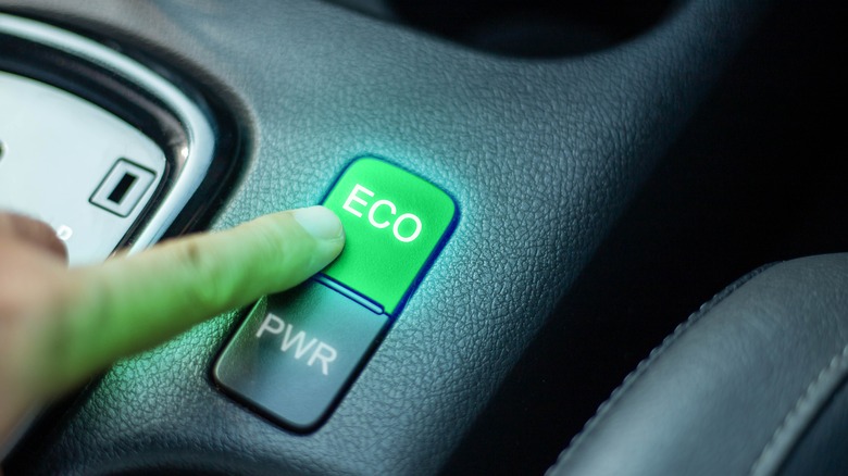 Pressing car's eco mode button