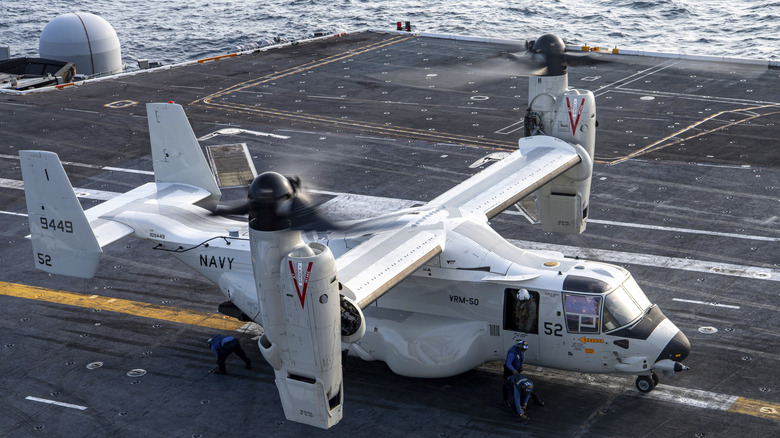 CMV-22B being chained down Nimitz