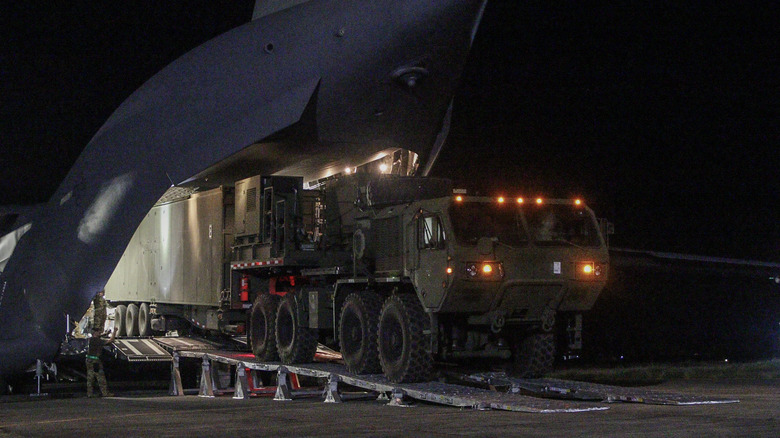 Typhon launcher getting off C-17.