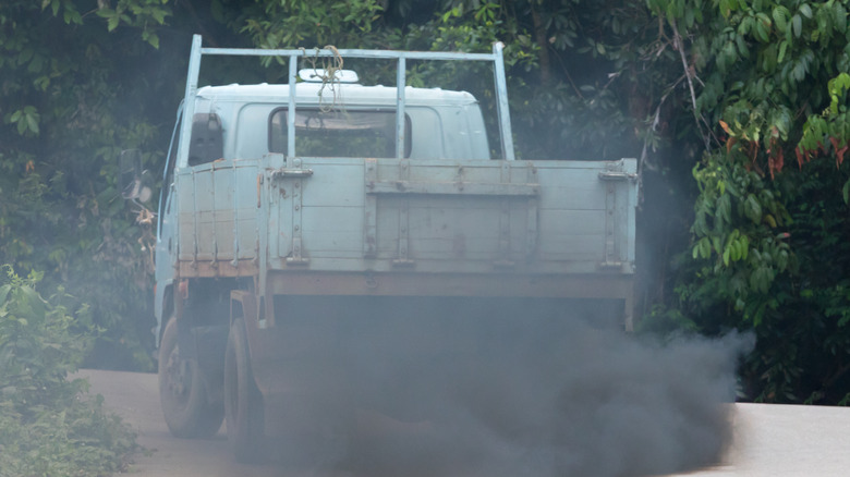 Diesel truck spewing black smoke