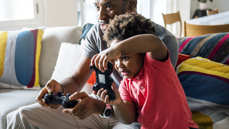 father son video game couch