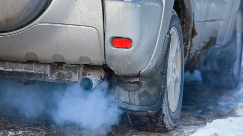 Car emitting exhaust pipe emission