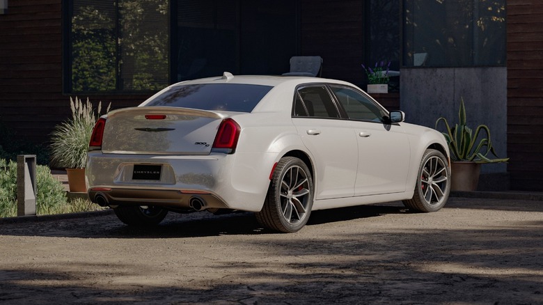 White Chrysler 300C in driveway