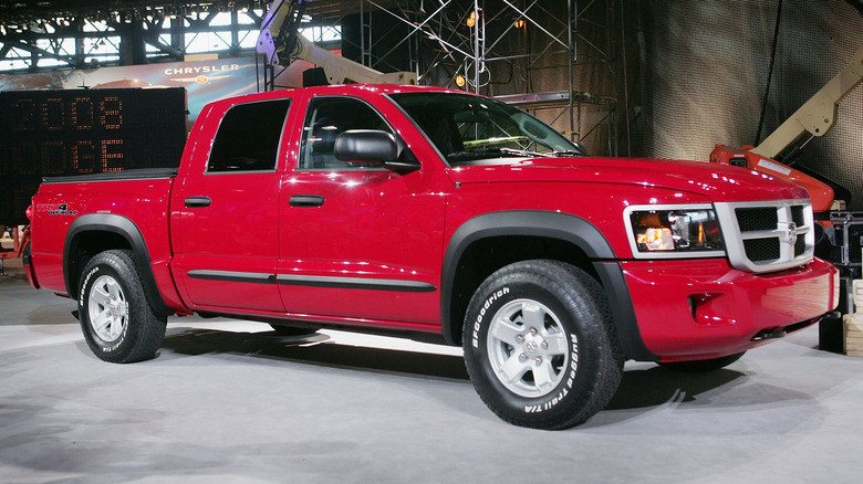 Red dodge dakota pickup truck on display