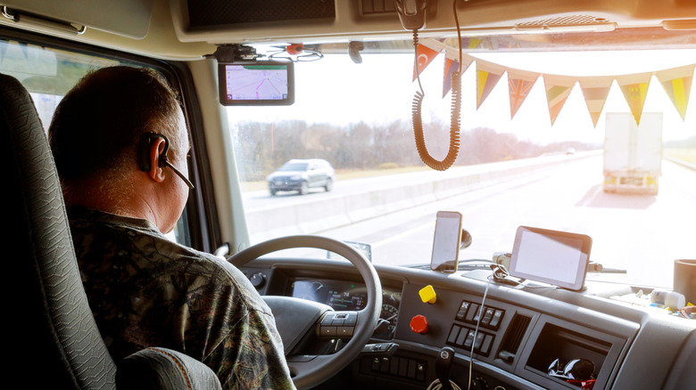 Truck driver in cabin