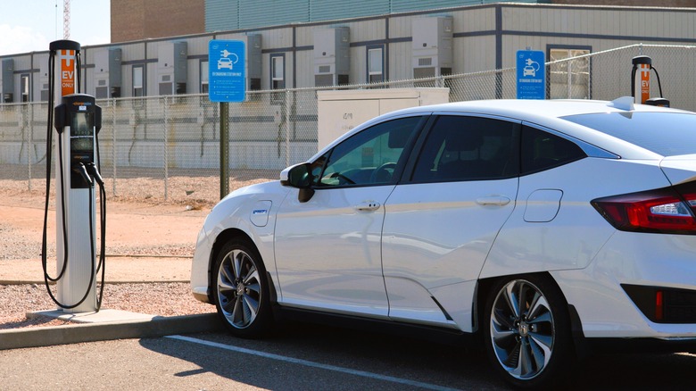 A Honda Clarity at an EV pump