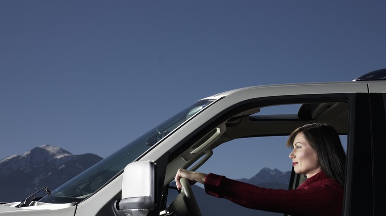 woman driving a car at night