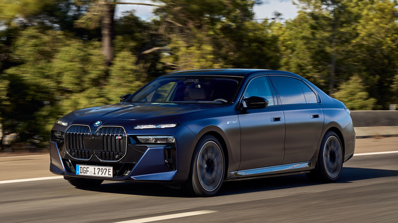 BMW i7 driving on road